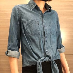 Knitted denim button up shirt.  Long sleeve that can be rolled up.  Size: SP